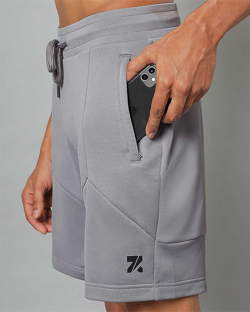 Light grey shorts made with moisture wicking, anti microbial properties, this short has unique 3d knitting texture which provides temperature regulation and  keeps the heat away during workouts
